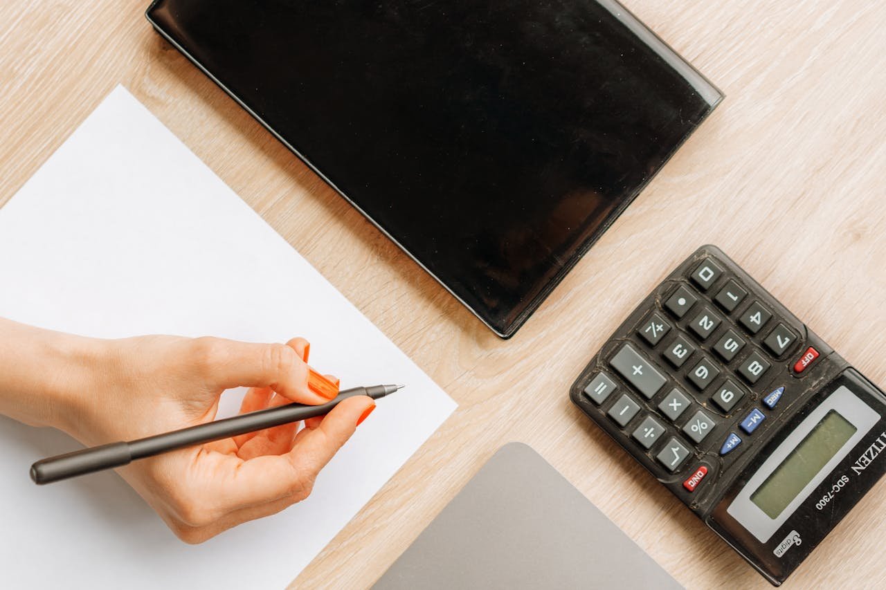 A person Holding a Pen